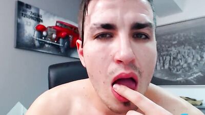 Naughty gay bloke is stroking his prick and flashing his ass