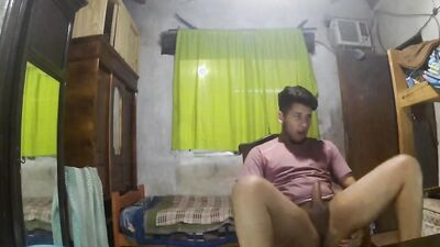 Amateur Latino is playing with his johnson in front of the camera