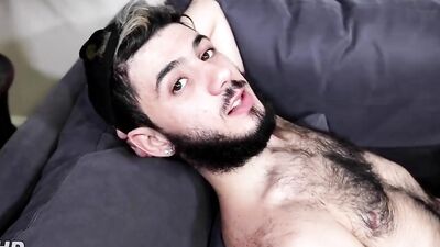 Two horny amateur lads are having sex on the couch