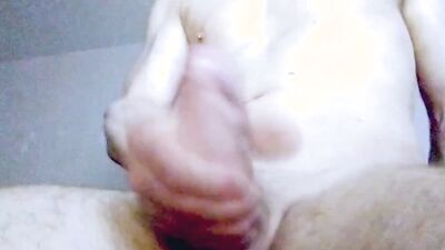 Jerking off a huge dick is hard work