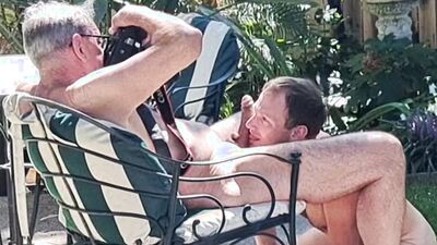 Jay Taylor and uncut boy outdoors