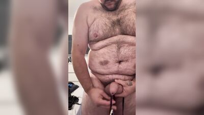 Cock and ball bondage with nipple clamps and butt plug