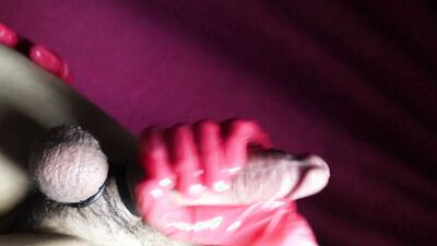 Professional massage of the penis until a flow of lubrication and passionate moans