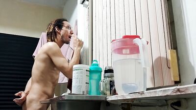 A mature man shaves a mustache and beard without clothes in the privacy of his home: Raba Erre Big