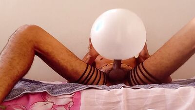 Fucking a glove balloon while wearing a rope corset. (DIY sextoy)