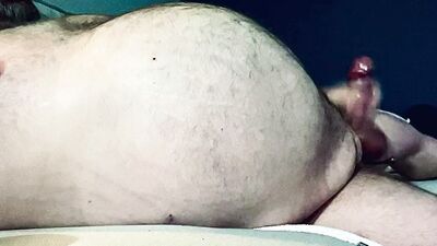 FAT DADDY STROKING HIS THICK UNCUT COCK ON THE COUCH