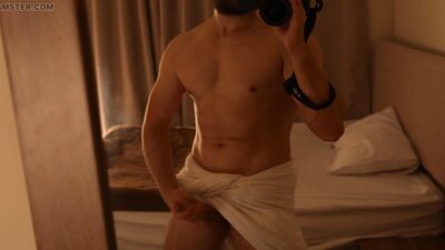 Before he could take off his towel, the pumped-up guy began to furiously jerk off his dick
