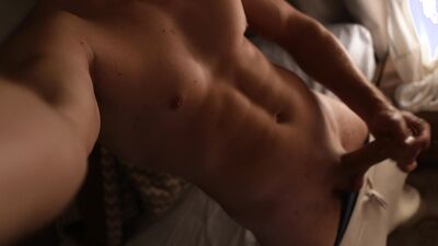 Hot guy stretches his cock before bed
