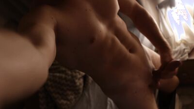 Hot guy stretches his cock before bed