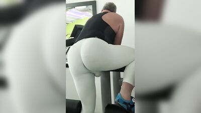 Tight white tights in a public gym at night