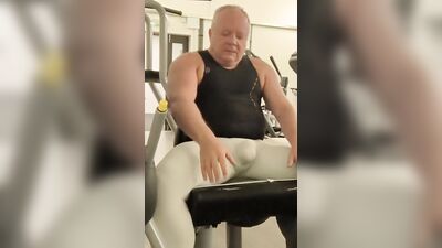 Tight white tights in a public gym at night