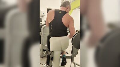 Tight white tights in a public gym at night