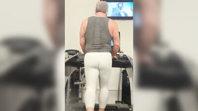 Tight white tights in a public gym at night