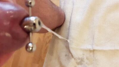 Penis tuner hollow screw urethral plug insertion and a cumshot through