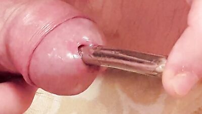 Extreme deep cock sounding close up and a cumshot while sounding rod is fully inside