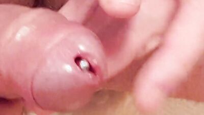 Extreme deep cock sounding close up and a cumshot while sounding rod is fully inside
