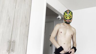 Latino Gay Guy Models His Mask and Puts on a Spectacular Show