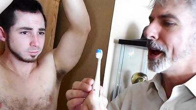 Mature Dude Tickles A Hot Jock While Being Bound