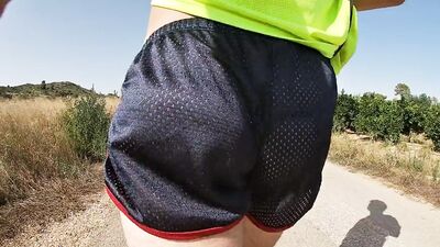 SO HOT RUNNING WITH MY ERECT COCK OUT WEARING SHINY SEE THRU COCK SPORT SHORTS
