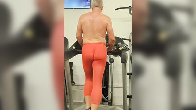 Thin tights and shirtless at the gym
