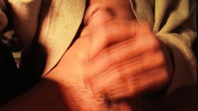 Hot naked guy in sweater jerking off his big cock, loud moans of intense pleasure