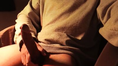 Hot naked guy in sweater jerking off his big cock, loud moans of intense pleasure