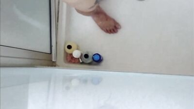 Dildo ass fucking in the shower