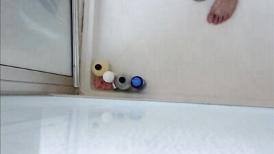 Dildo ass fucking in the shower