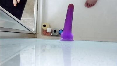 Dildo ass fucking in the shower