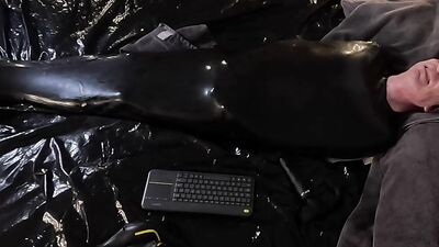 Cocooned in Latex and Teased with Buzzing Toys