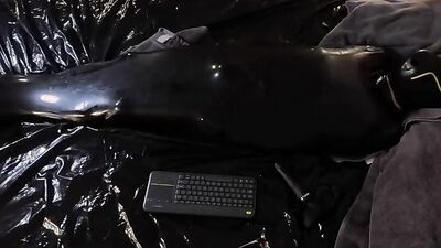 Cocooned in Latex and Teased with Buzzing Toys