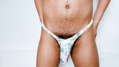 Cock in Brazilian thong
