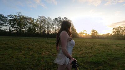 Fake tits Crossdresser Jon Scarecrow in lingerie having a walk and a wank in an open field