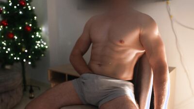 Hot muscular guy jerks off his cock after the gym