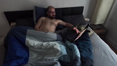 Watching porn in bed