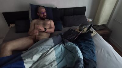 Watching porn in bed
