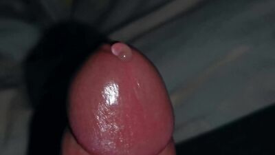 Very close-up of an over-excited penis and streams of pre-cum!
