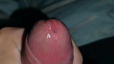 Very close-up of an over-excited penis and streams of pre-cum!