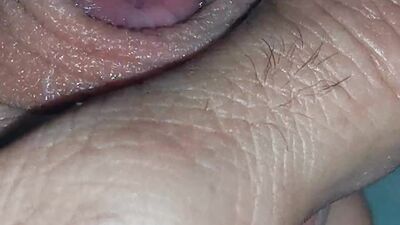 Very close-up of an over-excited penis and streams of pre-cum!