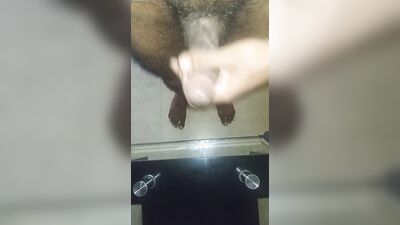 Jim jerks off and cums on the table
