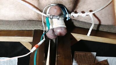 In my favorite position, balls tied and stretch, precum dripping nicely. All is right with the world.