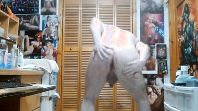 Oiled up and completely naked. Not even socks. Showing you everything and masturbating.