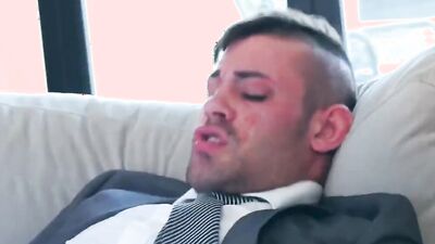 Two horny gay gentlemen are having sex on the couch