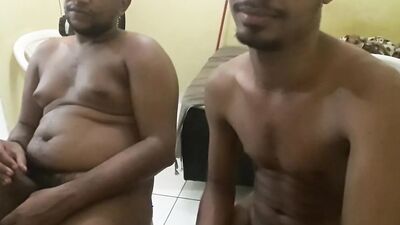 Two amateur Latinos are posing naked in front of the camera