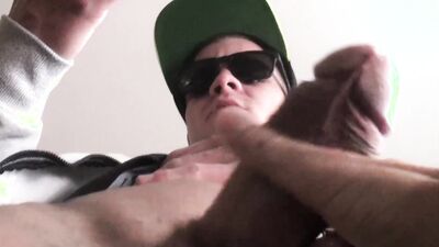 Cool guy jerks his cock casually in front of the camera and cums gigantically