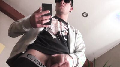 Cool guy jerks his cock casually in front of the camera and cums gigantically
