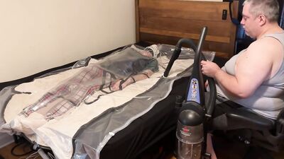 Feb 19 2023 - A very relaxing session in the vacbag with my spinal brace, C-Collar & PVC Aprons