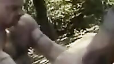 Erik Mann's muscular body takes on a group of horny guys in a public forest