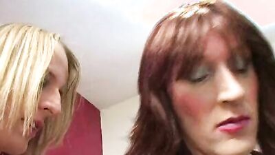 Watch as a crossdresser and two other guys get down and dirty in a steamy lingerie threesome