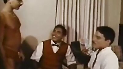 Muscular hunk serves up a wild bareback threesome to two lucky guys in a hotel room